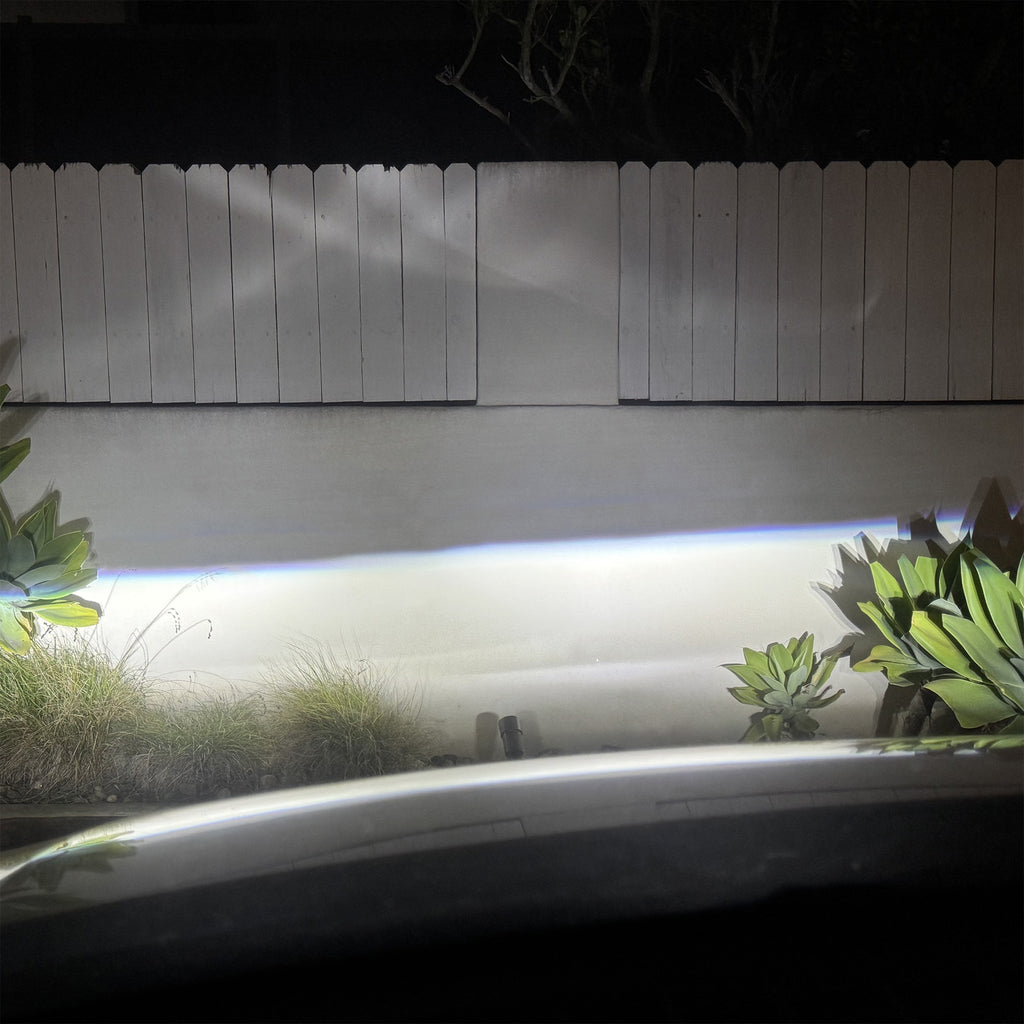 Cayenne 958.2 Matrix LED Headlight lighting on white fence
